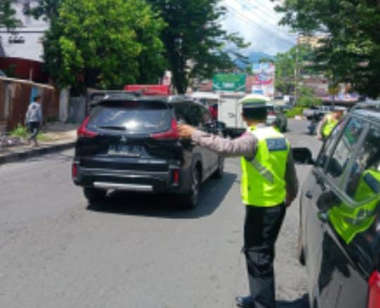 Personel Sat Lantas Polresta Manado Gelar Program Inovasi Pos Cakalang: Upaya Efektif Cegah Kemacetan dan Pelanggaran